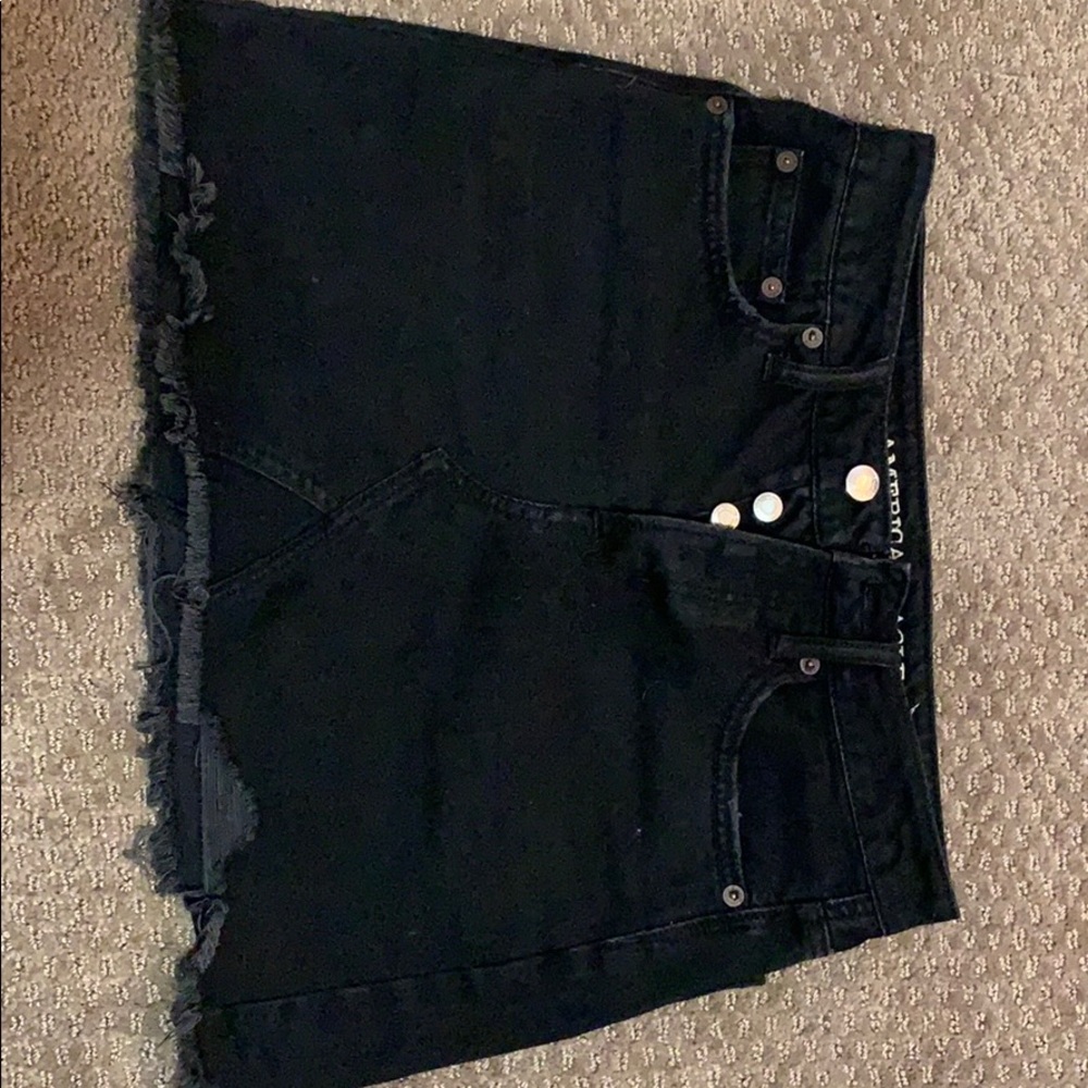Black denim mini skirt